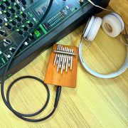 Hokema B9 elecktro kalimba with cables and headphones | weplaywelltogether