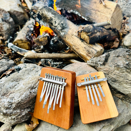 Hokema B9 and B5 kalimbas by the campfire | weplaywelltogether