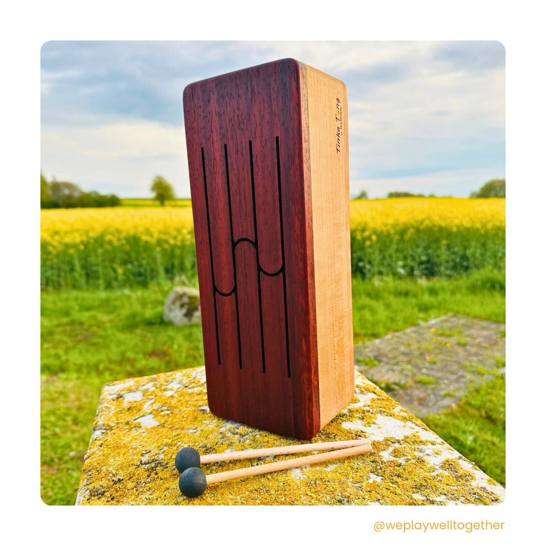 feeltone Tinka Tong wooden tongue drum with mallets in nature | weplaywelltogether