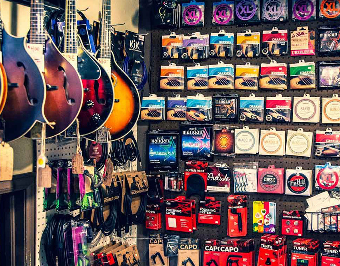 Inside Kind Mountain Collective music store in Idaho Springs, Colorado, featuring Hokema Kalimbas