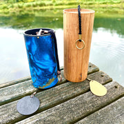 Set of a Zaphir Chime Blue and Koshi Chime Aqua  sitting on a wooden dock in front of a lake | weplaywelltogether 