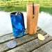 Set of a Zaphir Chime Blue and Koshi Chime Aqua  |weplaywelltogether sitting on a wooden dock in front of a lake