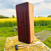 feetone Tinka Tong tongue drum in Air tuning with mallets by the field | weplaywelltogether