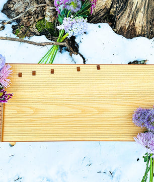 feeltone Monolina in snow with flowers | weplaywelltogether