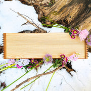 feeltone monolini in a snow with flowers | weplaywelltogether