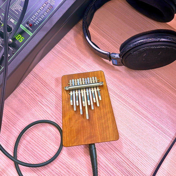 Hokema B11 elecktro kalimba with cables and headphones | weplaywelltogether