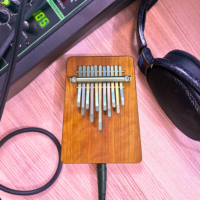 Hokema B11 elecktro kalimba with cables and headphones | weplaywelltogether