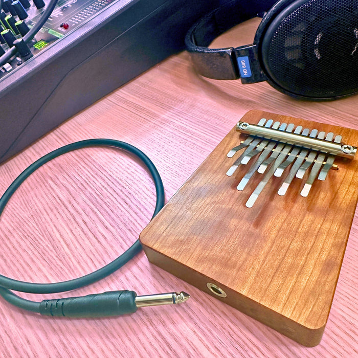 Hokema B11 elecktro kalimba with cables and headphones | weplaywelltogether