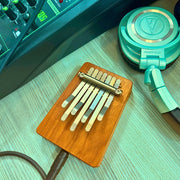 Hokema B7 electro kalimba with cables and headphones | weplaywelltogether