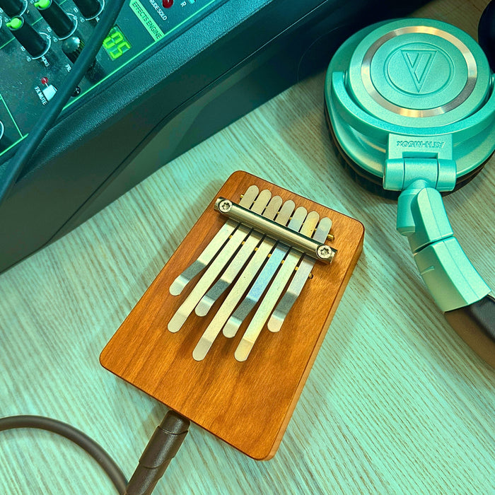 Hokema B7 electro kalimba with cables and headphones | weplaywelltogether