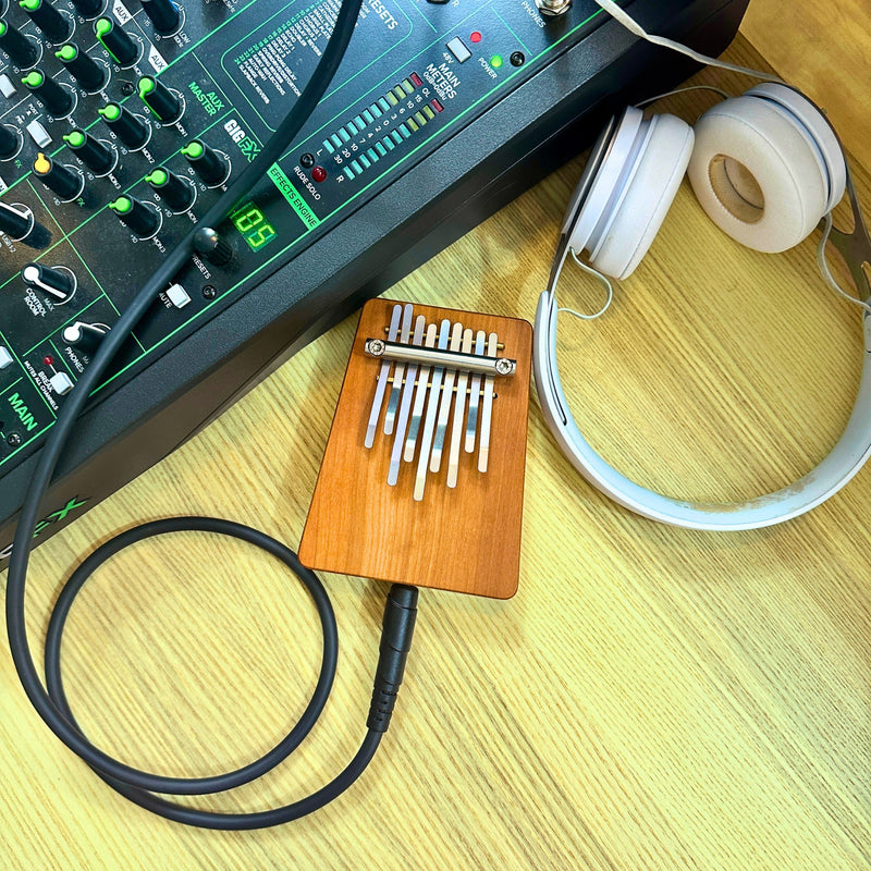 Hokema B9 elecktro kalimba with cables and headphones | weplaywelltogether