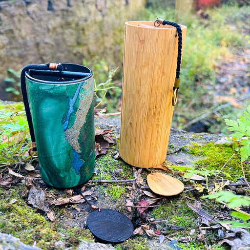 Koshi Terra chime and green Zaphir chime on green moss | weplaywelltogether