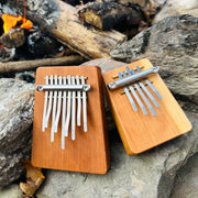 Hokema B9 and B5 kalimbas tuned in fire element by the campfire | weplaywelltogether