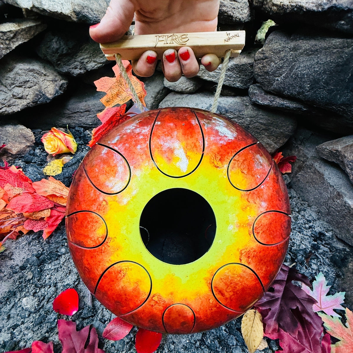 Kigonki metal tongue drum - fire collection on a fire pit | weplaywelltogether