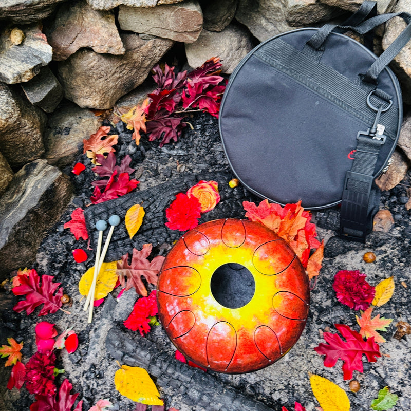 Kigonki binaural metal tongue drum and a bag by the campfire | weplaywelltogether