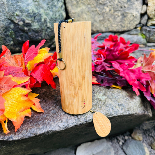 Koshi Ignis chime on a rock with all leafs | weplaywelltogether