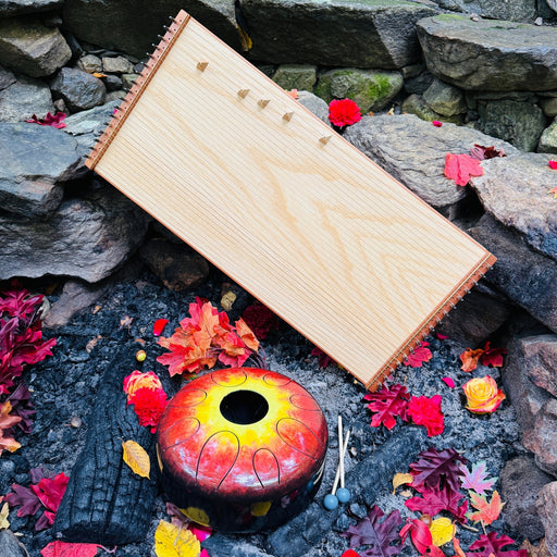feeltone Monolina monochord and Kigonki binaural metal tongue drum at the campfire | weplaywelltogether