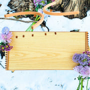 feeltone Monolini Monochord and stand in snow | weplaywelltogether