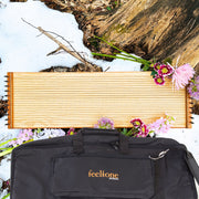 feeltone Monolini Monochord and carrying case in snow | weplaywelltogether
