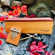 feeltone Fire Tinka Tong, a wooden tonbue drum with mallets and Hokema B5 fire kalimba | weplaywelltogether