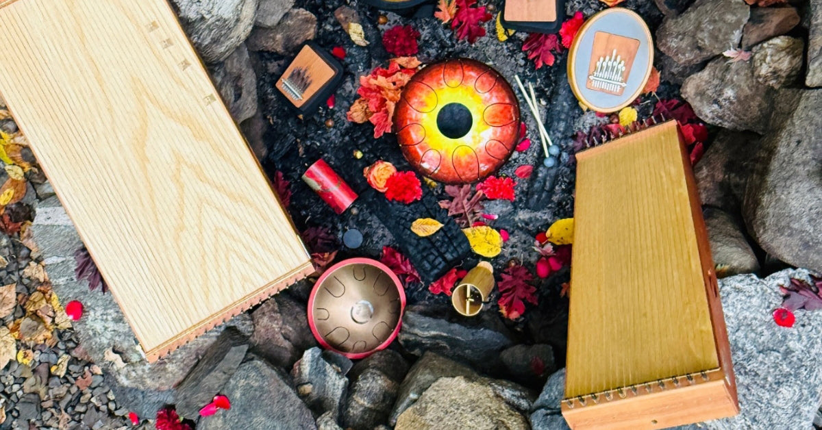 feeltone Monolina and Monolini monochords, Kigonki metal tongue drum, Zenko elemental metal tongue drum, Hokema Sansula Renaissance and B9 kalimbas, Koshi and Zaphir chimes at the fire pit | weplaywelltogether