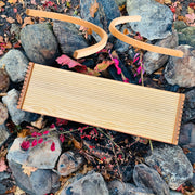 feeltone Monolini Monochord and stand by the rocks | weplaywelltogether