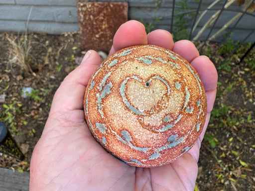 Round ceramic rattle / weplaywelltogether