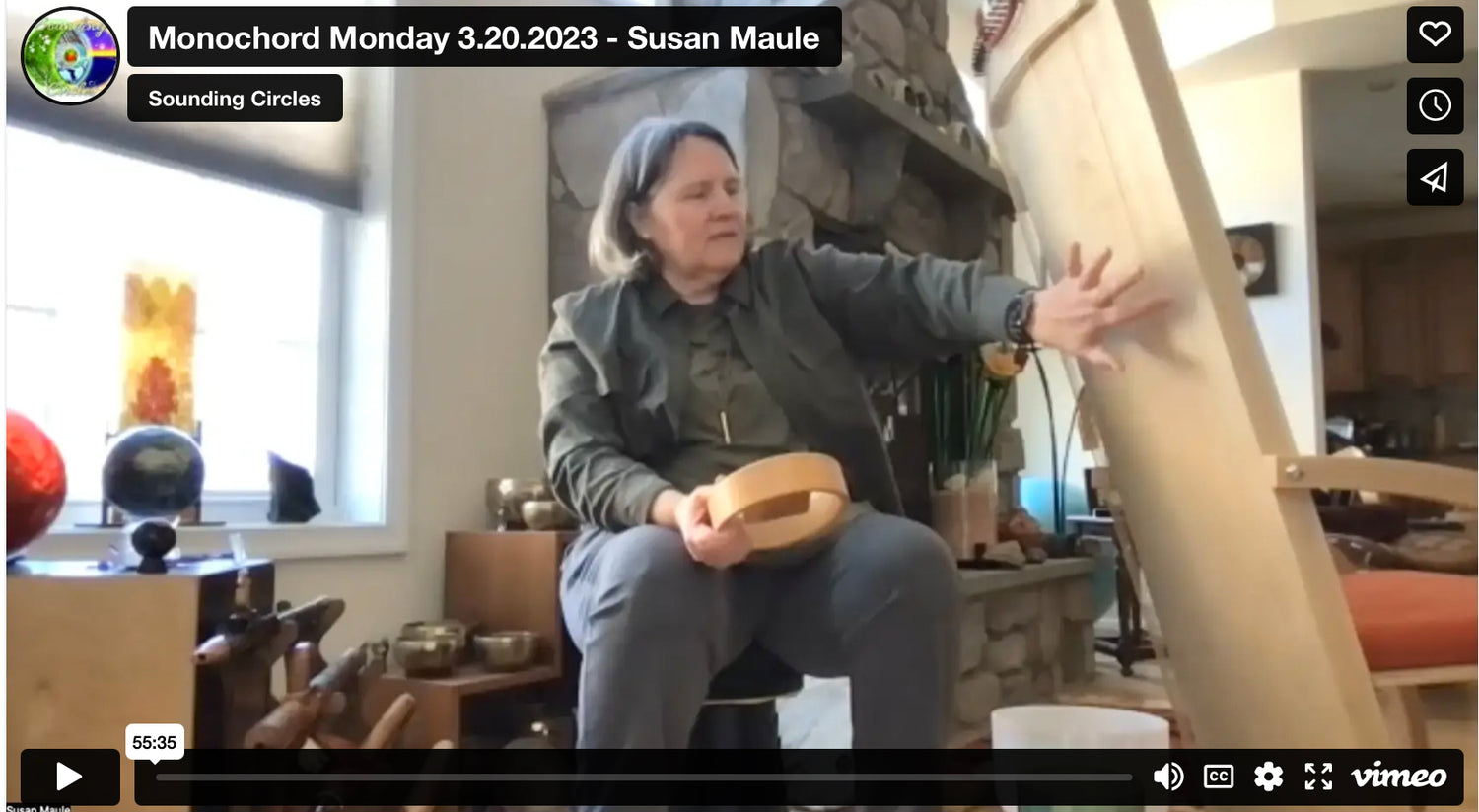 Susan Maule with feeltone Monchair, a musical wooden chair that has strings attached on the back to allow full body vibration when played. Susan is holding a Hokema Sansula kalimba on her right hand. | weplaywelltogether 