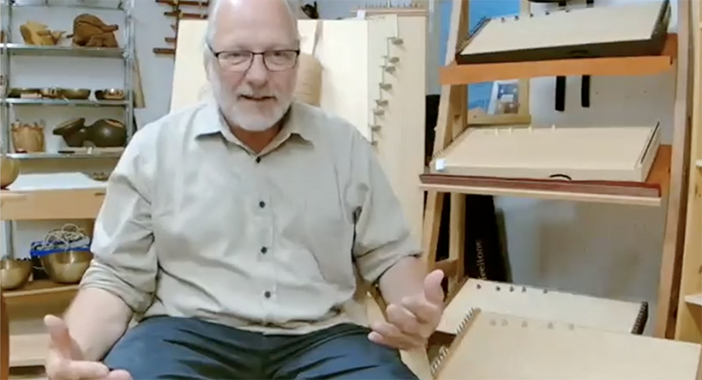Ingo Böhme, founder of feeltone with monochords on the background | weplaywelltogether
