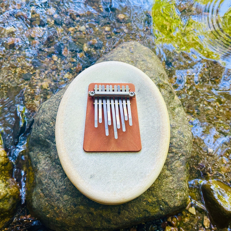 Hokema sansula deluxe kalimba by the water | weplaywelltogether