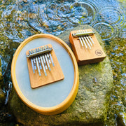 Hokema Sansula Renaissance and B5 Aqua kalimba by the water | weplaywelltogether