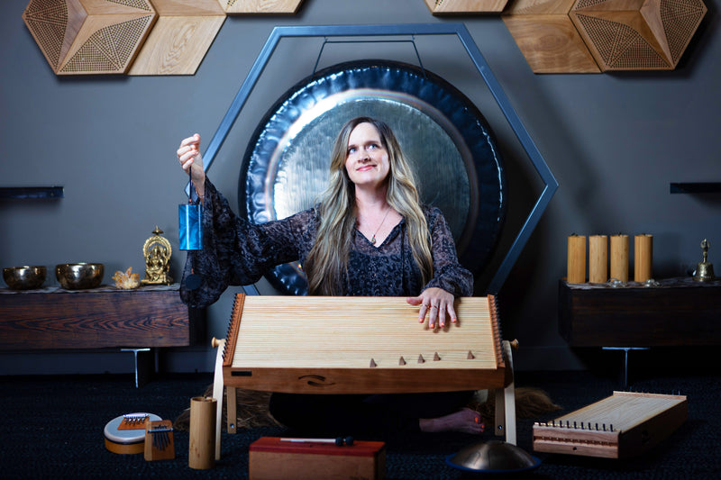 Joule L'Adara with feeltone monochord and tinka tong, wooden tongue drum, Hokema Sansula Basic and B5 kalimbas, Koshi and Zaphir chimes | weplaywelltogether