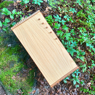 feeltone monochord with bag in nature | weplaywelltogether