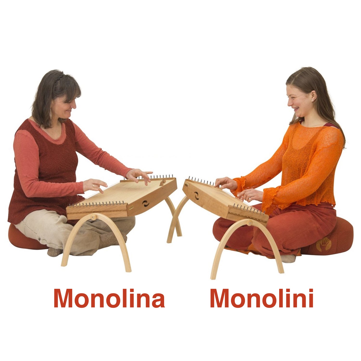 Two women sitting in front of each other playing feeltone Monolina and Monolini - type of monochords. Monolina has 34 strings and Monolini 21. | weplaywelltogether