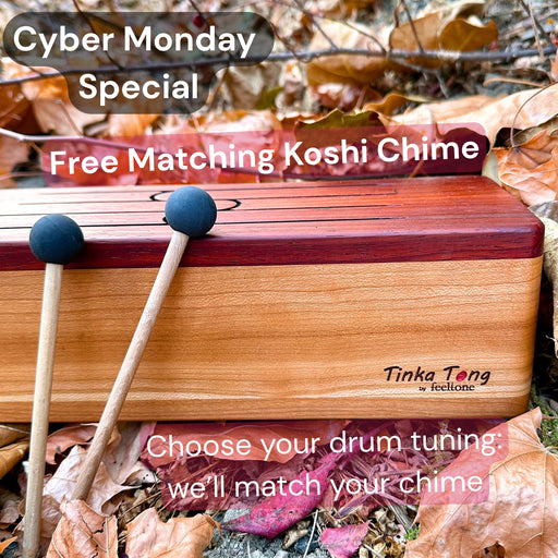 Cyber Monday flyer - feeltone Tinka Tong wooden tongue drum with mallets on the ground with leafs | weplaywelltogether